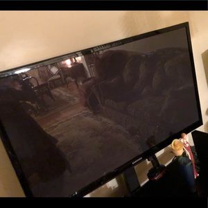 50 inch Samsung hd tv with hanging set if needed.